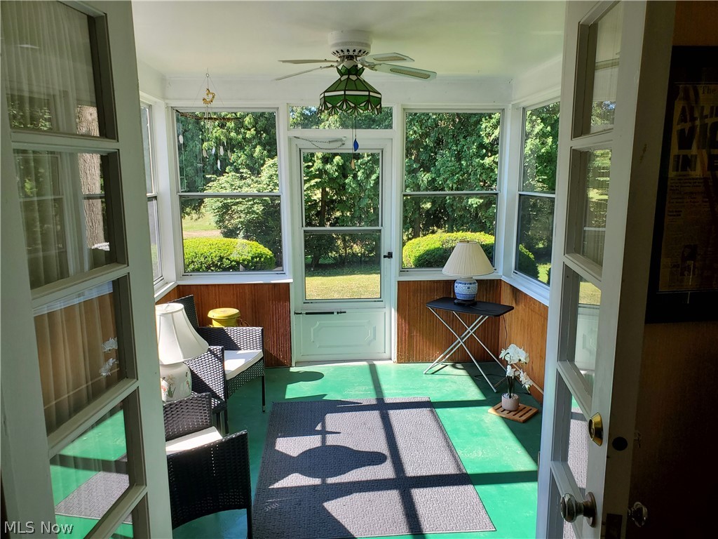 8121 Johnnycake Ridge Road Mentor, OH 44060 - Photo 14 of 39 Sunroom / solarium with ceiling fan