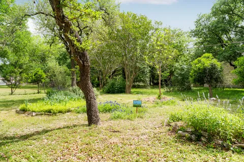 a view of backyard with green space