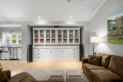 a living room with furniture and window