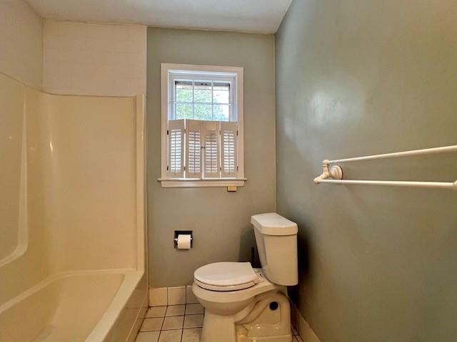 4541 Arcado Road Southwest Lilburn, GA 30047 - Photo 13 of 16 a bathroom with a toilet and a shower
