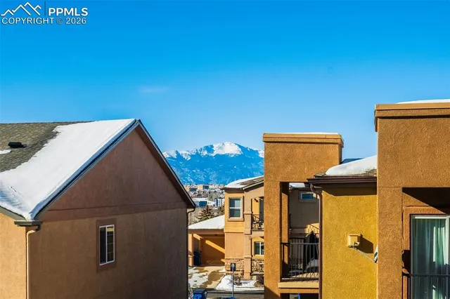a kitchen with refrigerator and stove