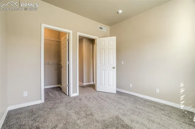 a view of a storage & utility room with closet