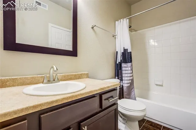 a view of a swimming pool with a lounge chairs