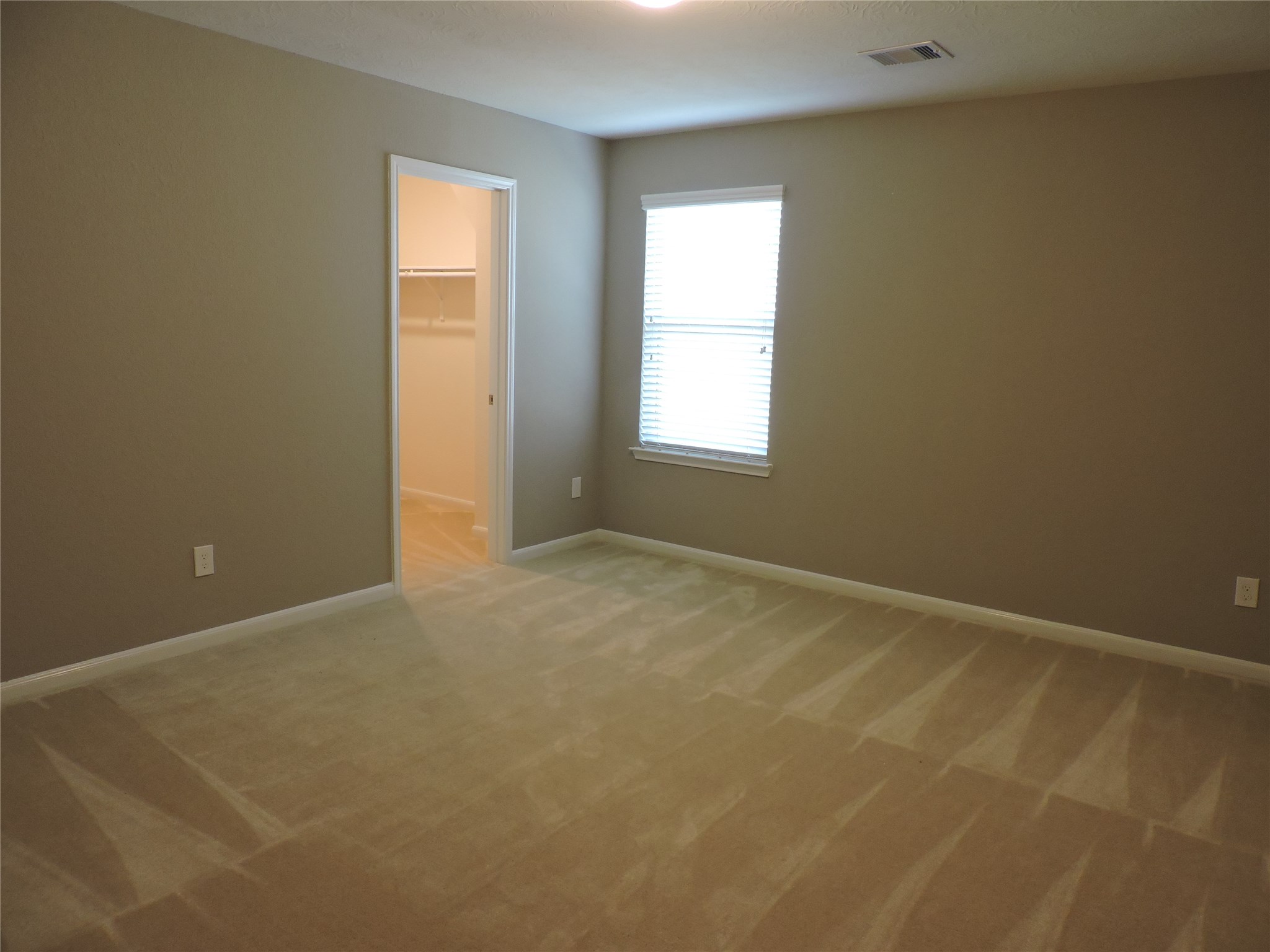 1102 Upton Court Conroe, TX 77304 - Photo 18 of 30 an empty room with a window