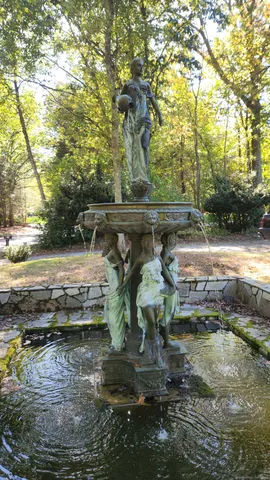 a backyard of a house with barbeque oven