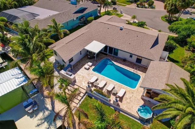 a view of swimming pool with seating area