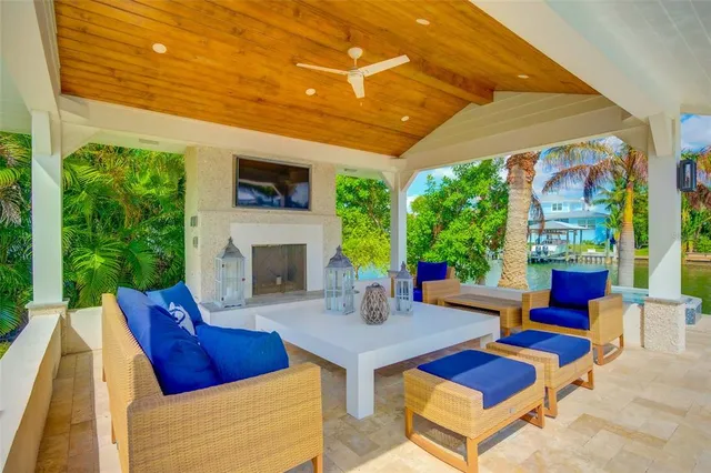 a view of swimming pool with outdoor seating