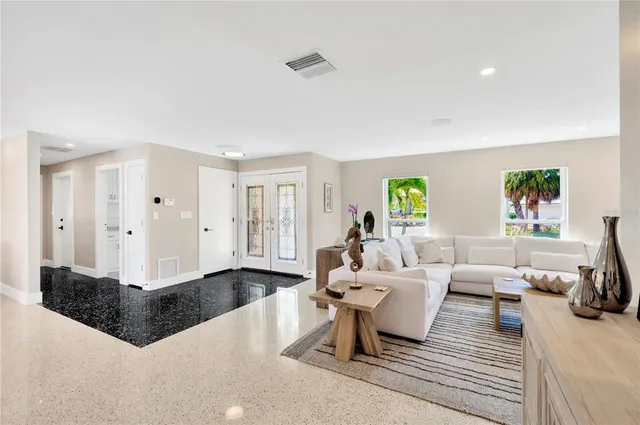 a view of a big room with a big yard and plants