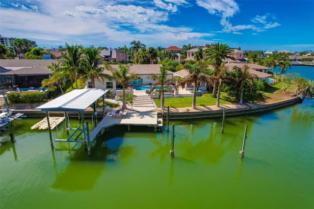 an aerial view of a houses with outdoor space