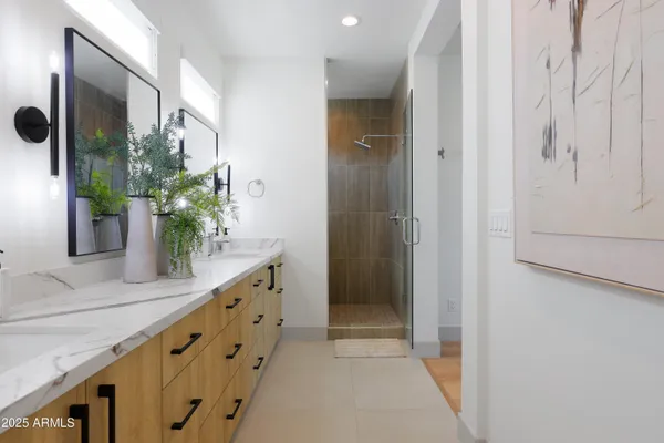 a view of hallway with wooden floor