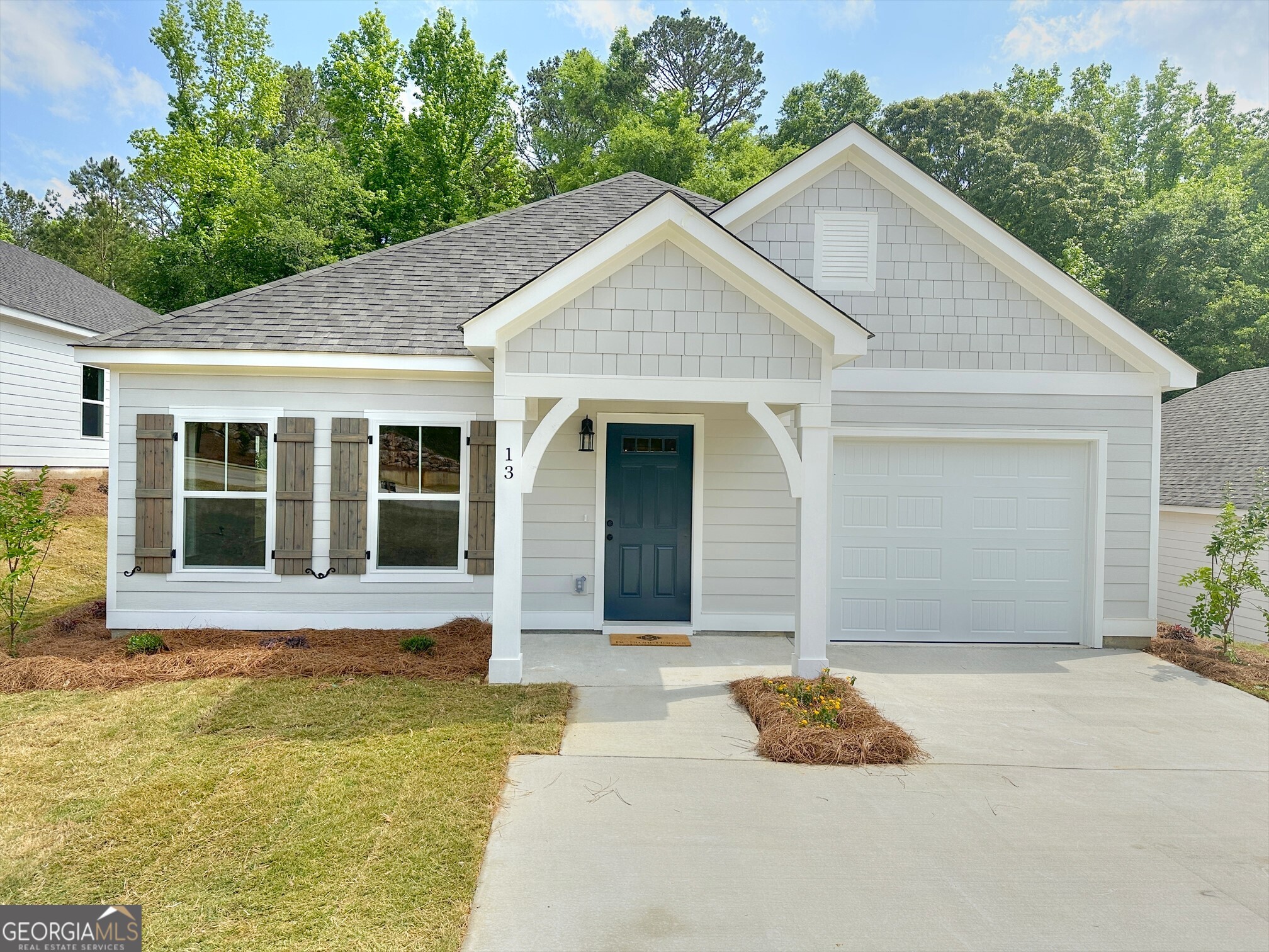 13 River's Edge Lane Franklin, GA 30217 - Photo 1 of 1 a front view of a house with garden