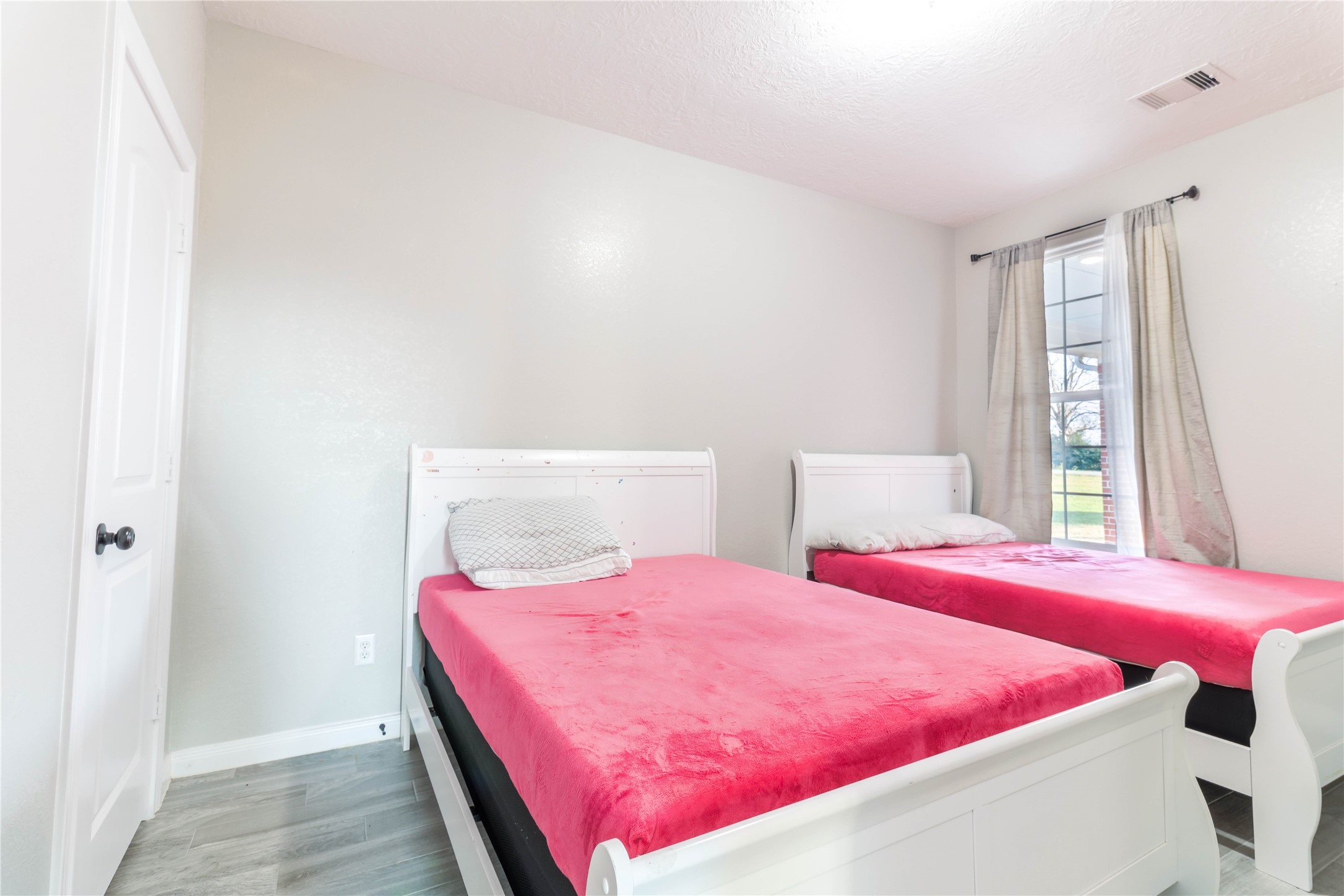 38938 Mt Zion Road Pattison, TX 77423 - Photo 14 of 15 a bedroom with a bed and window