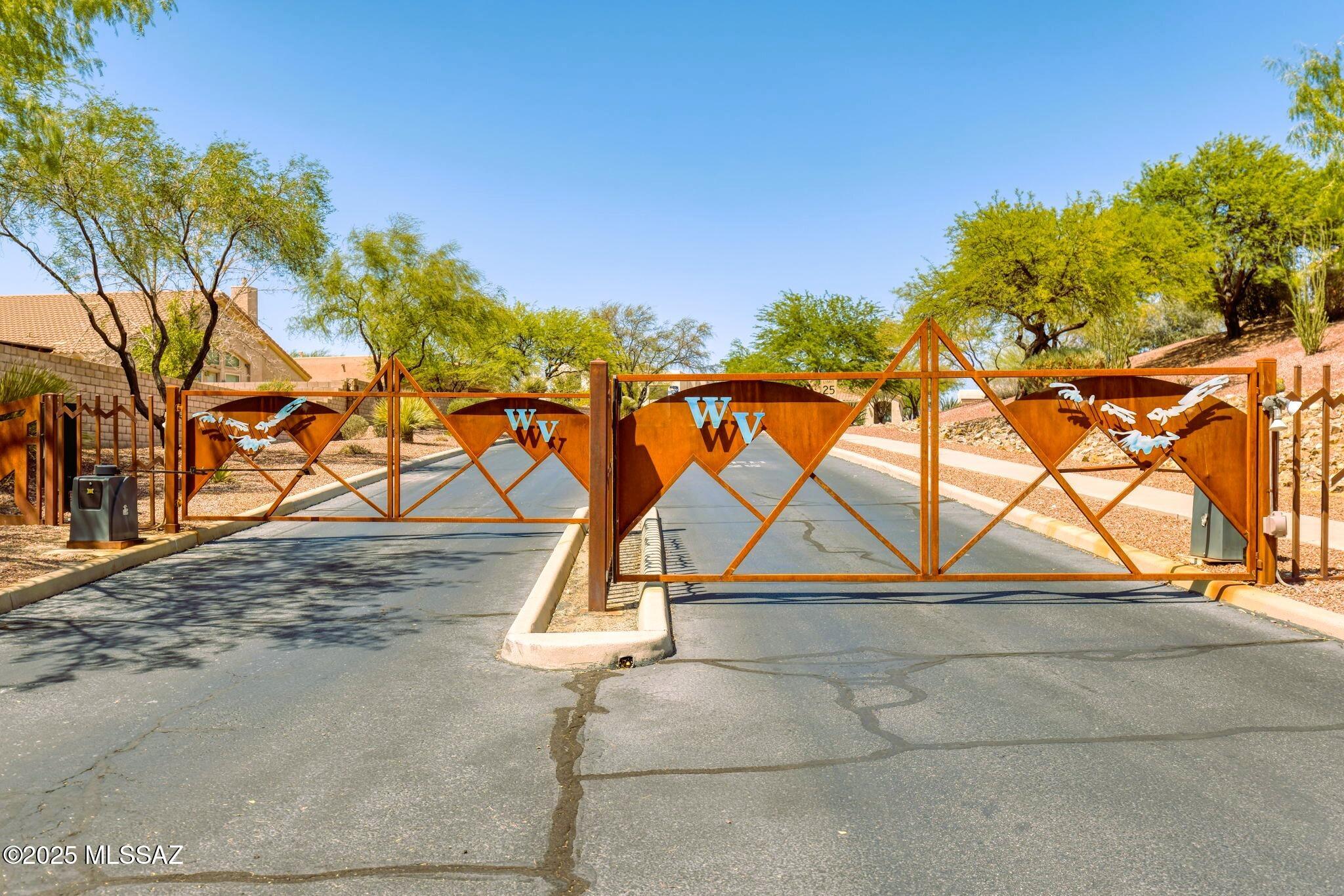 10612 South Blackhawk Ridge Place Vail, AZ 85641 - Photo 13 of 40 25-Security Gate Entrance