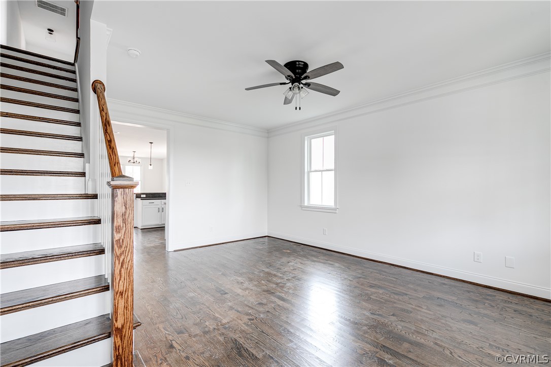2403 Everett Street Richmond, VA 23224 - Photo 2 of 25 a view of empty room with wooden floor and fan