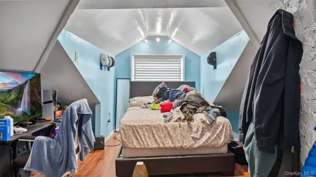 a bathroom with a sink a toilet and shower curtain