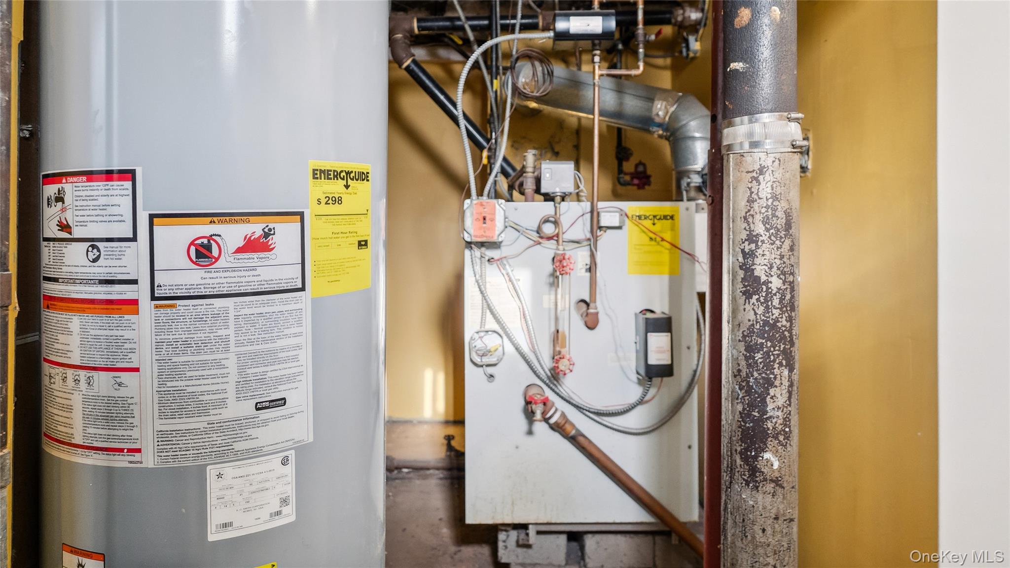 56-12 135th Street Queens, NY 11355 - Photo 20 of 23 a utility room with dryer and washer