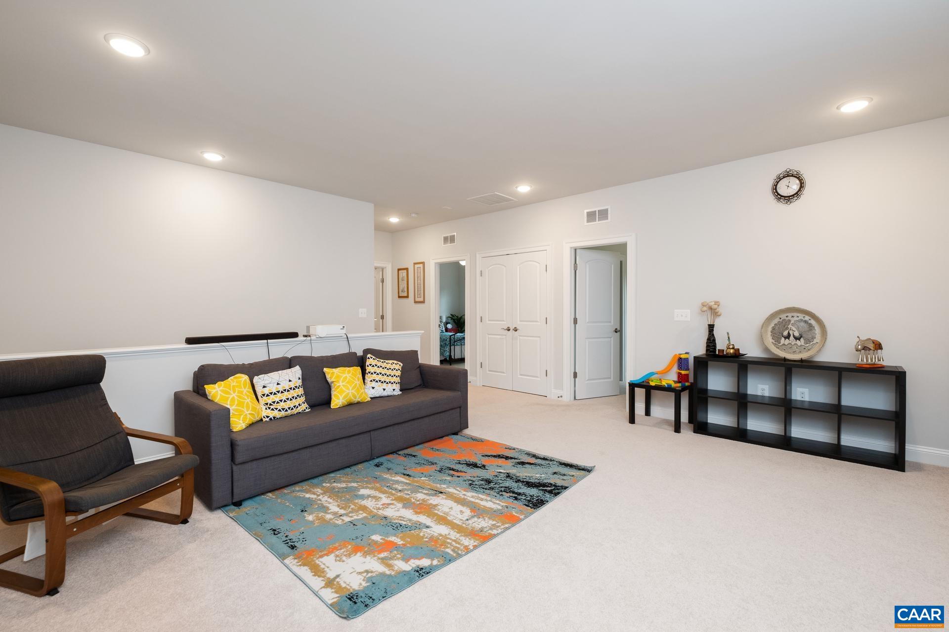 3232 Bergen Street Charlottesville, VA 22902 - Photo 20 of 31 a living room with furniture and a couch