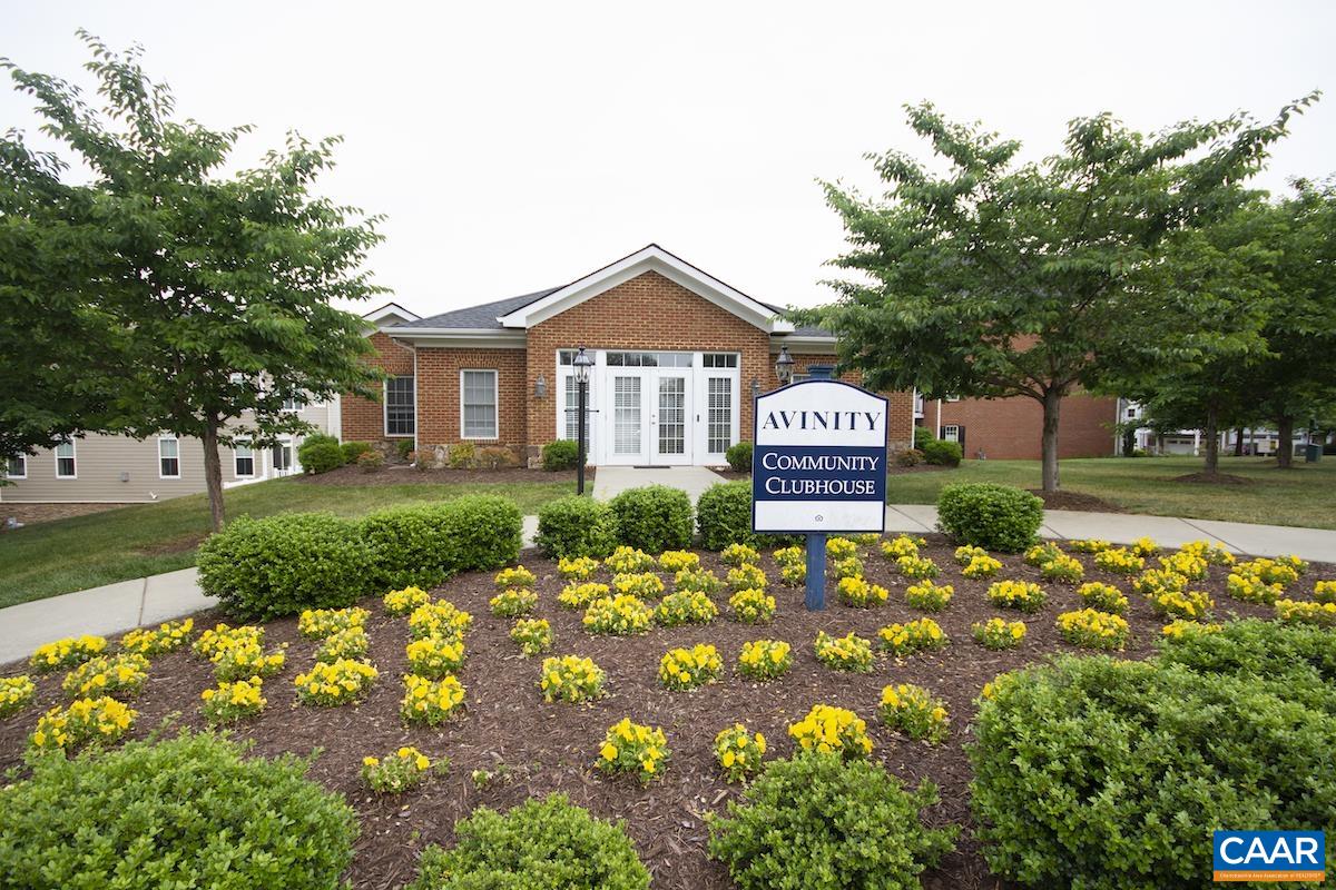 3232 Bergen Street Charlottesville, VA 22902 - Photo 21 of 31 a front view of a house with a yard and garage