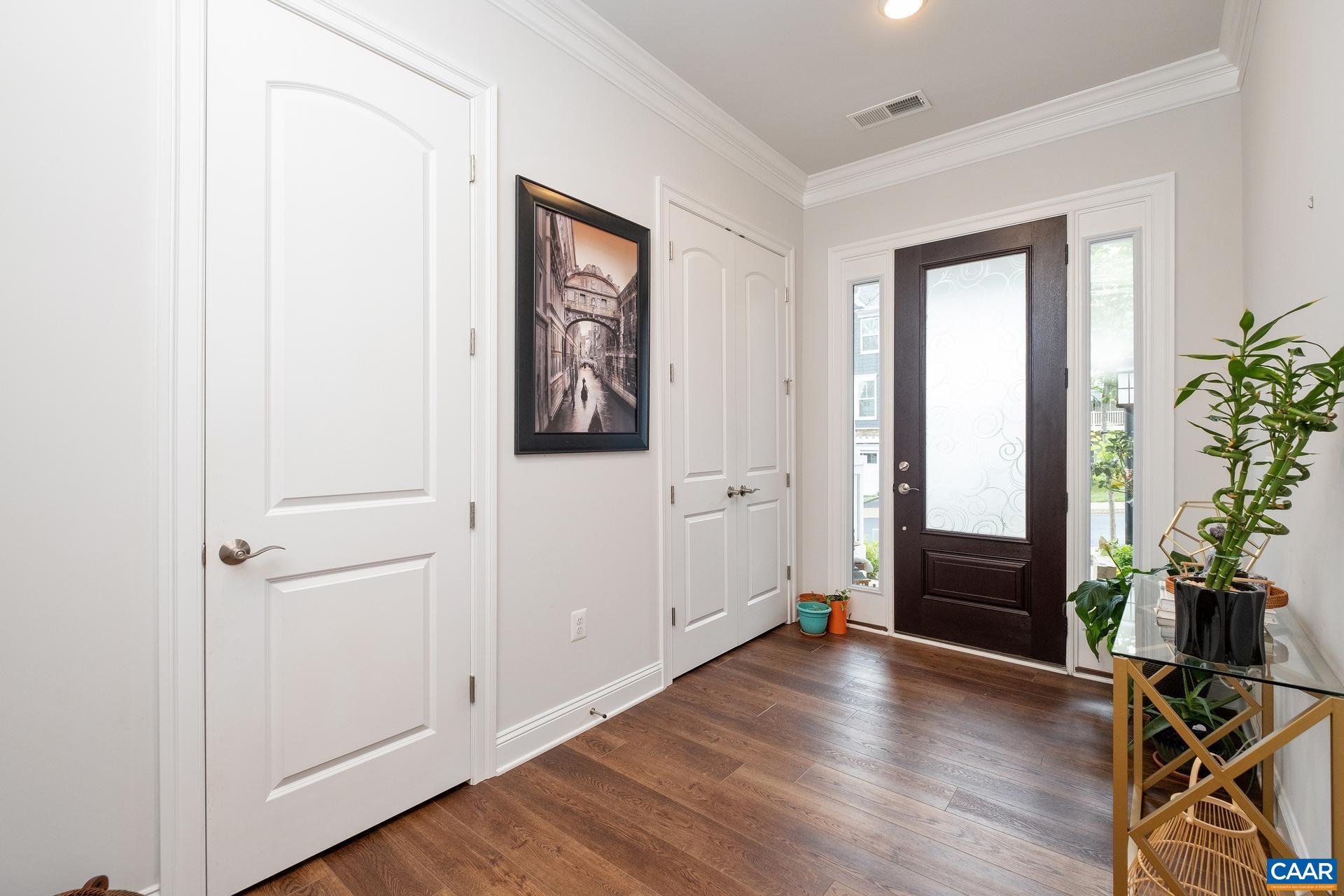 3232 Bergen Street Charlottesville, VA 22902 - Photo 3 of 31 an empty room with wooden floor and windows
