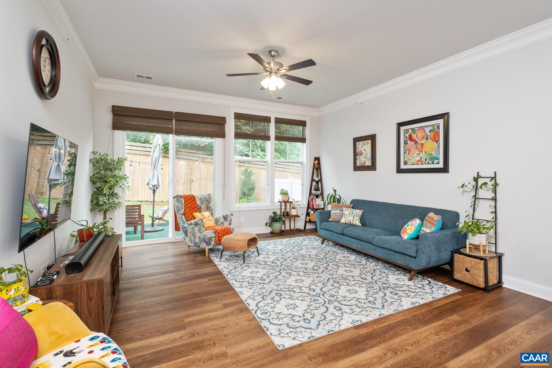 3232 Bergen Street Charlottesville, VA 22902 - Photo 7 of 31 a living room with furniture and a flat screen tv