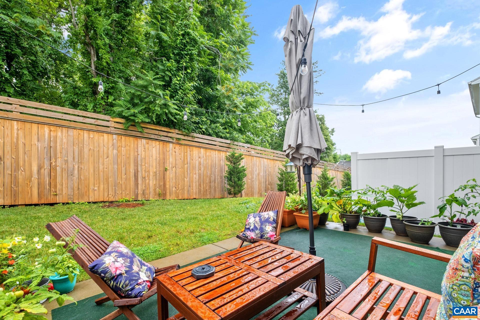 3232 Bergen Street Charlottesville, VA 22902 - Photo 9 of 31 a view of a backyard with sitting area furniture and garden