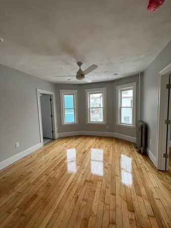 a view of livingroom with hardwood floor and window