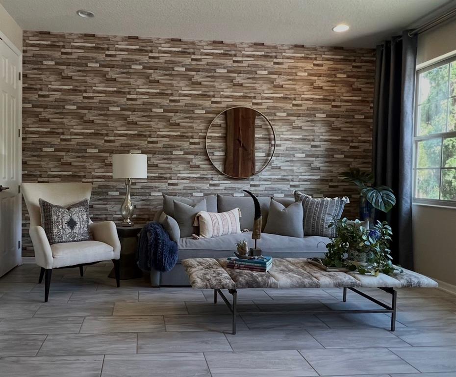 714 Riviera Bella Drive DeBary, FL 32713 - Photo 12 of 50 a living room with furniture