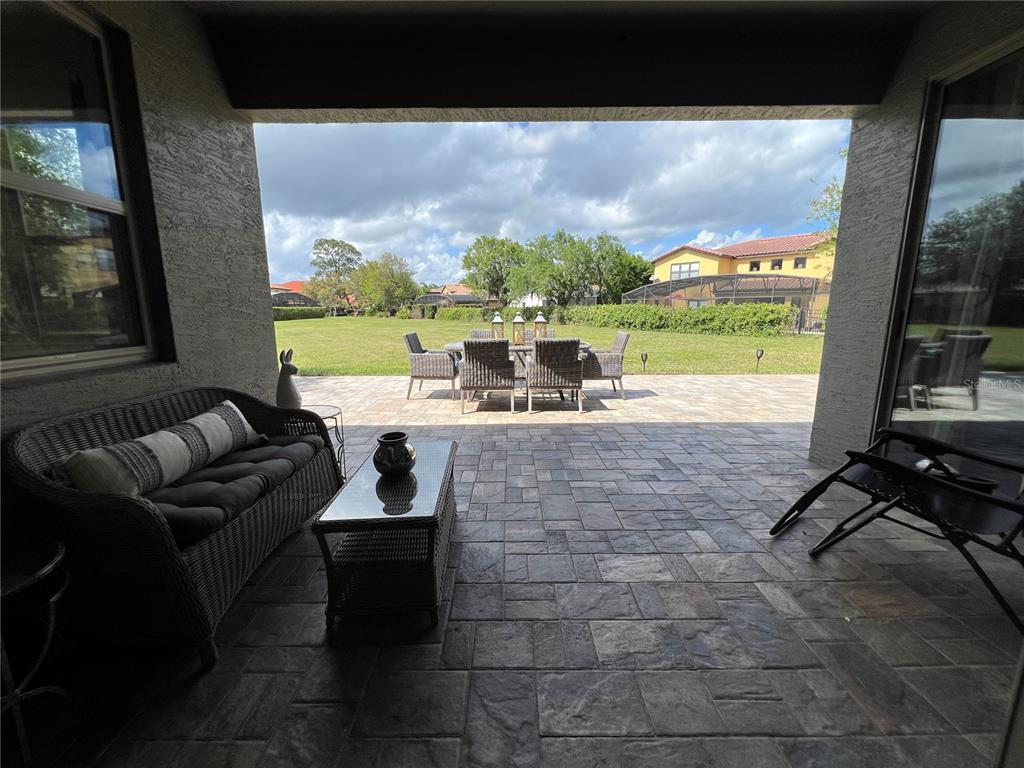714 Riviera Bella Drive DeBary, FL 32713 - Photo 20 of 50 a living room with patio garden