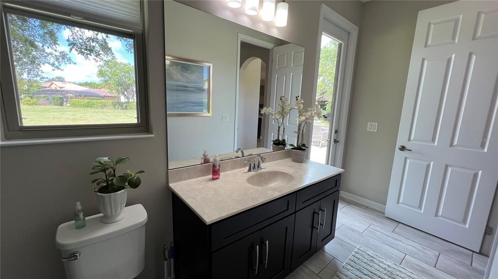714 Riviera Bella Drive DeBary, FL 32713 - Photo 30 of 50 a bathroom with a sink and a mirror