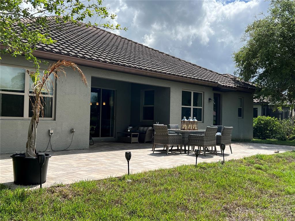 714 Riviera Bella Drive DeBary, FL 32713 - Photo 36 of 50 a view of a house with patio
