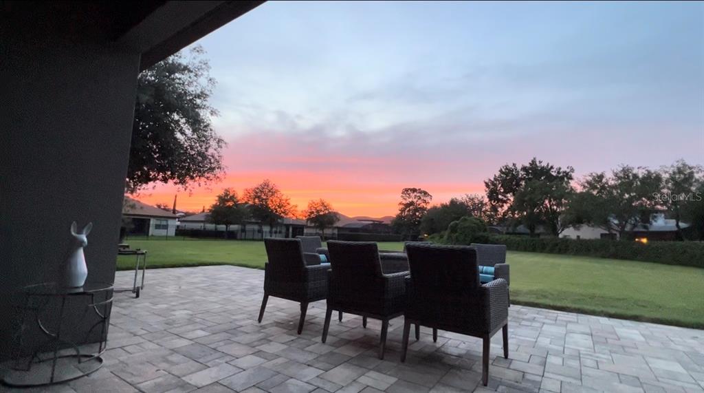 714 Riviera Bella Drive DeBary, FL 32713 - Photo 37 of 50 a view of a chairs and table in the garden