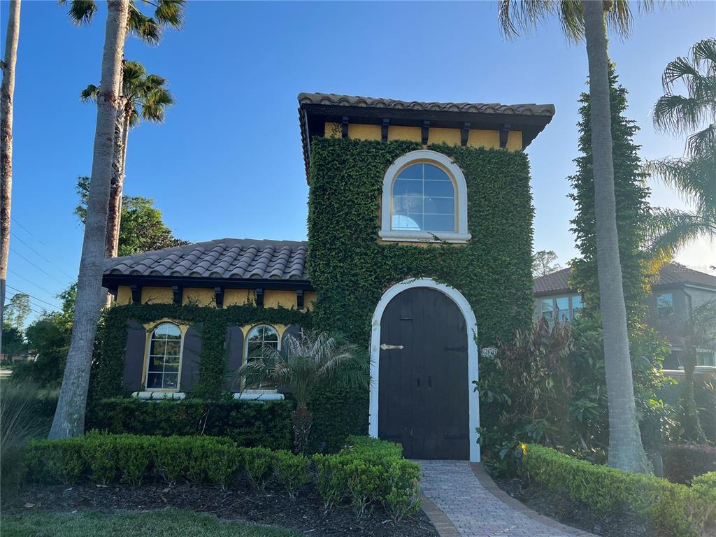 714 Riviera Bella Drive DeBary, FL 32713 - Photo 39 of 50 a front view of a house with garden