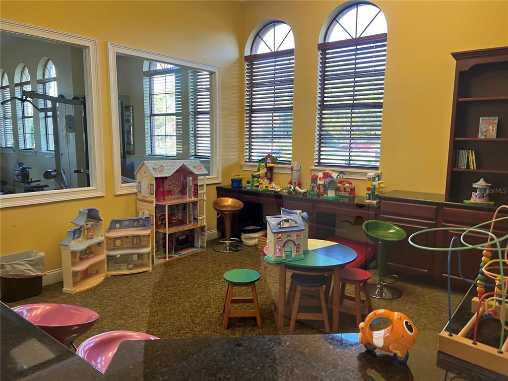 714 Riviera Bella Drive DeBary, FL 32713 - Photo 43 of 50 a dining room with furniture and a floor to ceiling window