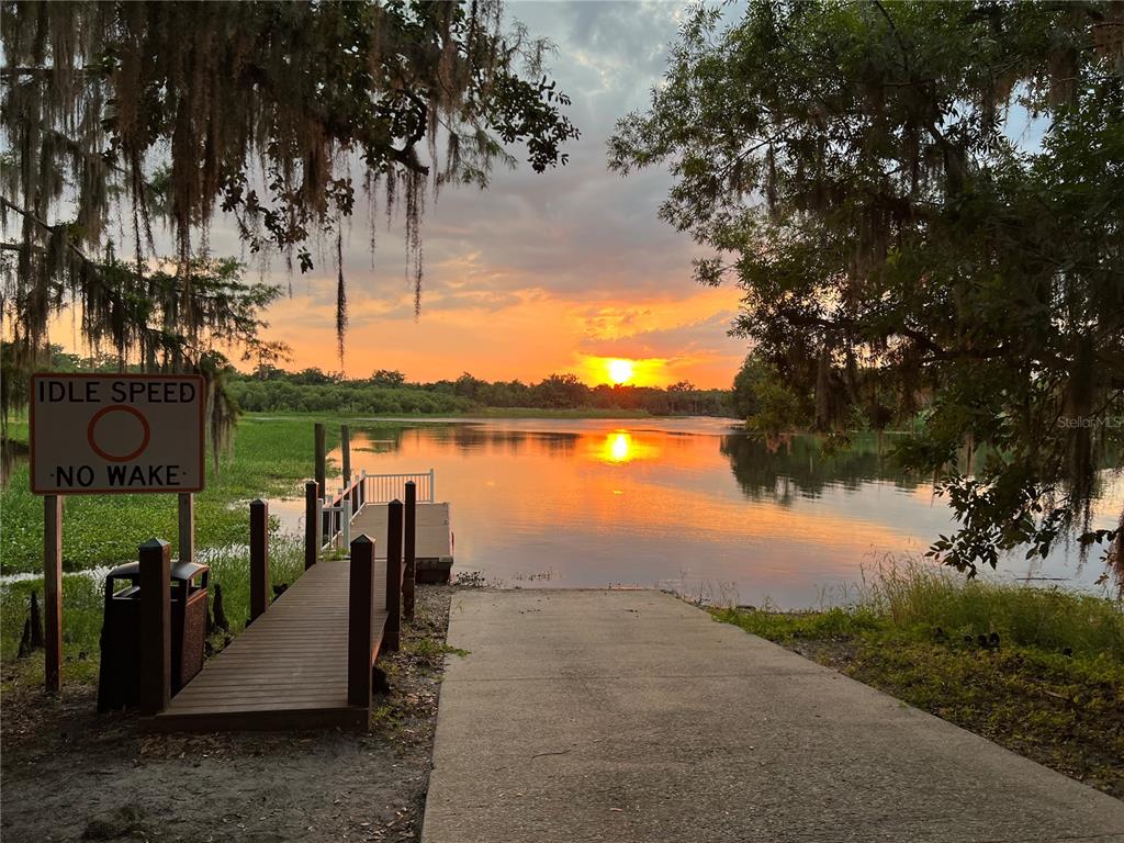 714 Riviera Bella Drive DeBary, FL 32713 - Photo 50 of 50 a view of a lake with a mountain in the background