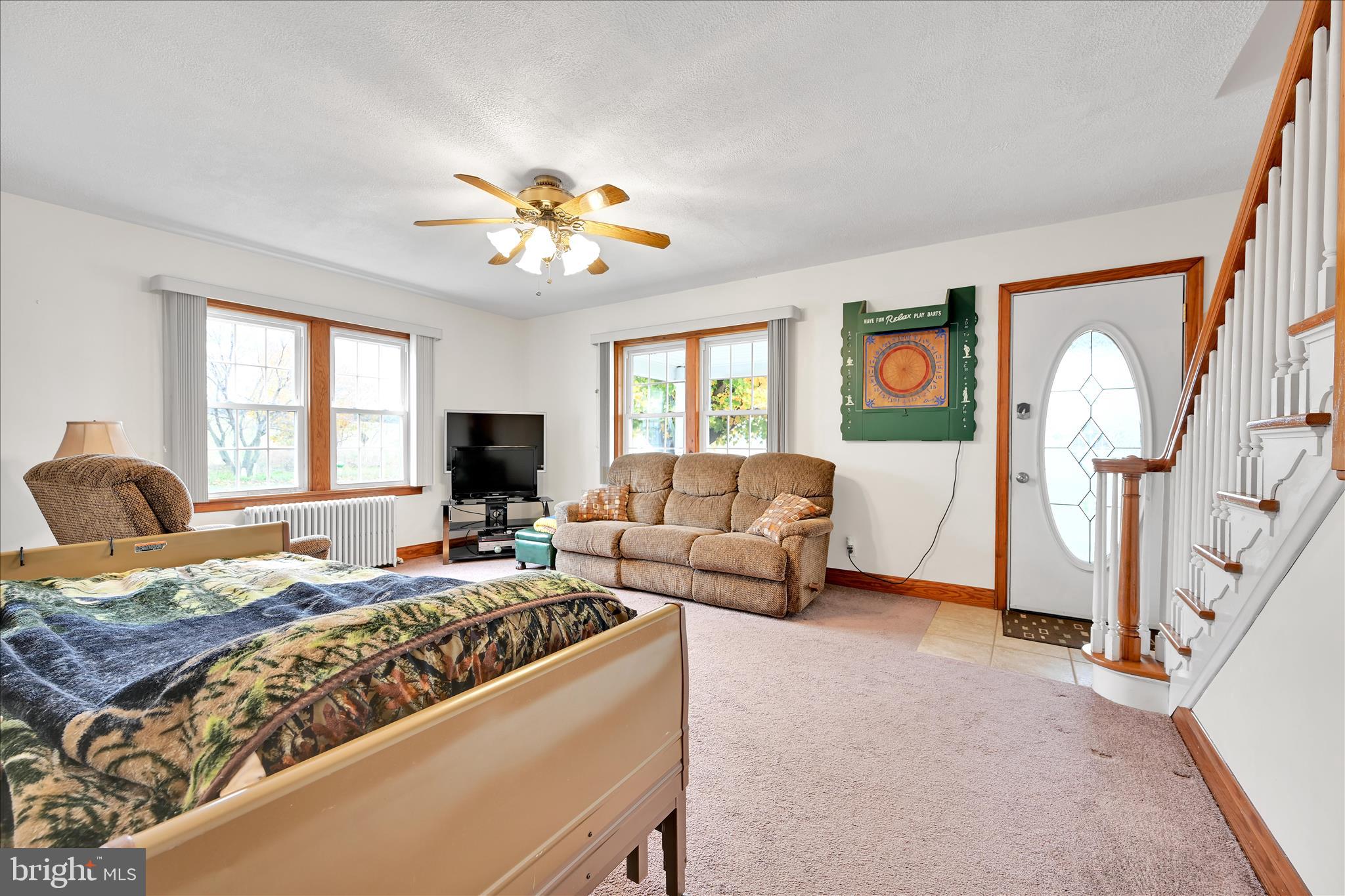 209 Ridge Road Pitman, PA 17964 - Photo 14 of 41 a living room with furniture and a flat screen tv