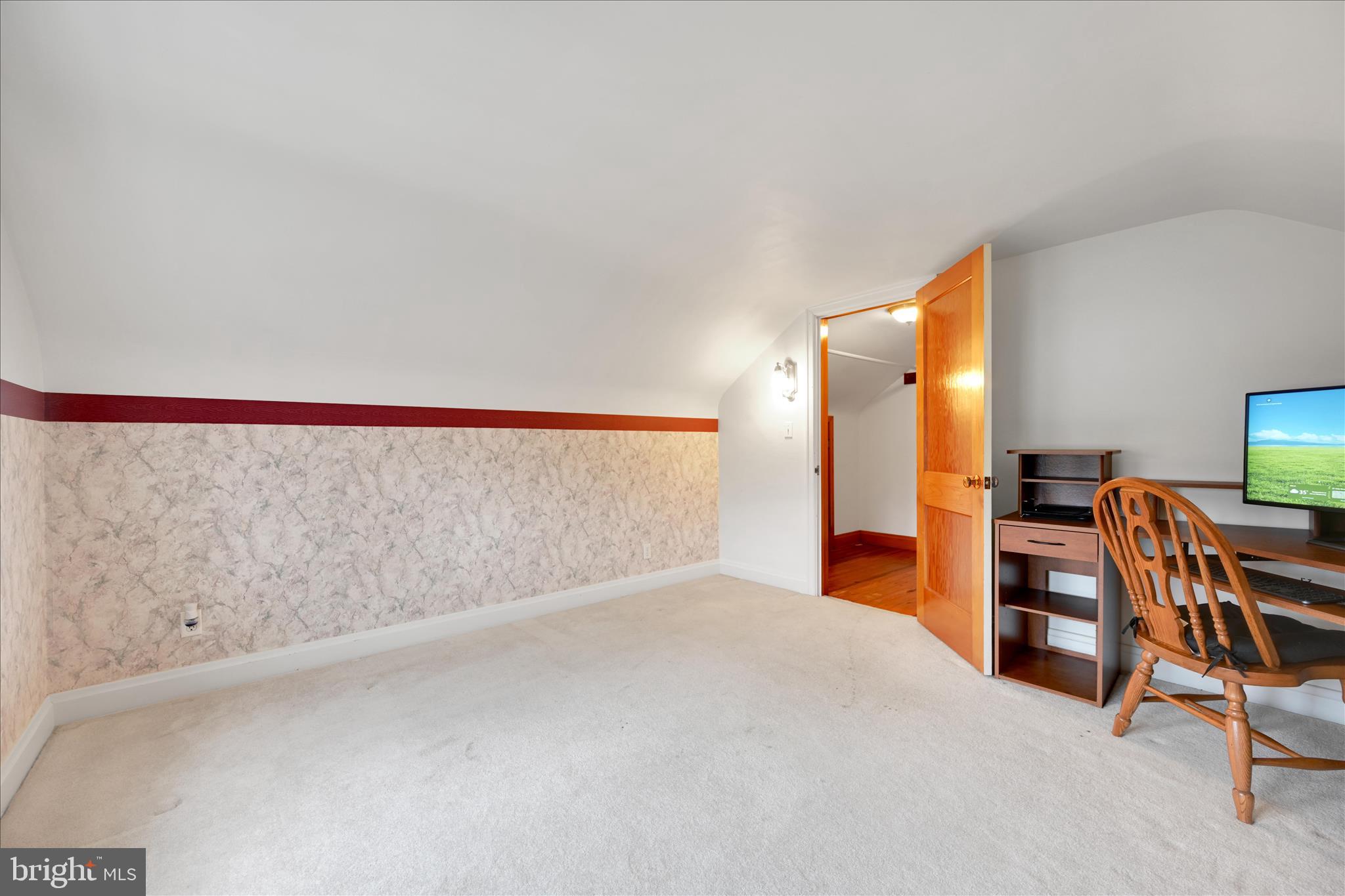 209 Ridge Road Pitman, PA 17964 - Photo 25 of 41 a view of an empty room with furniture and staircase