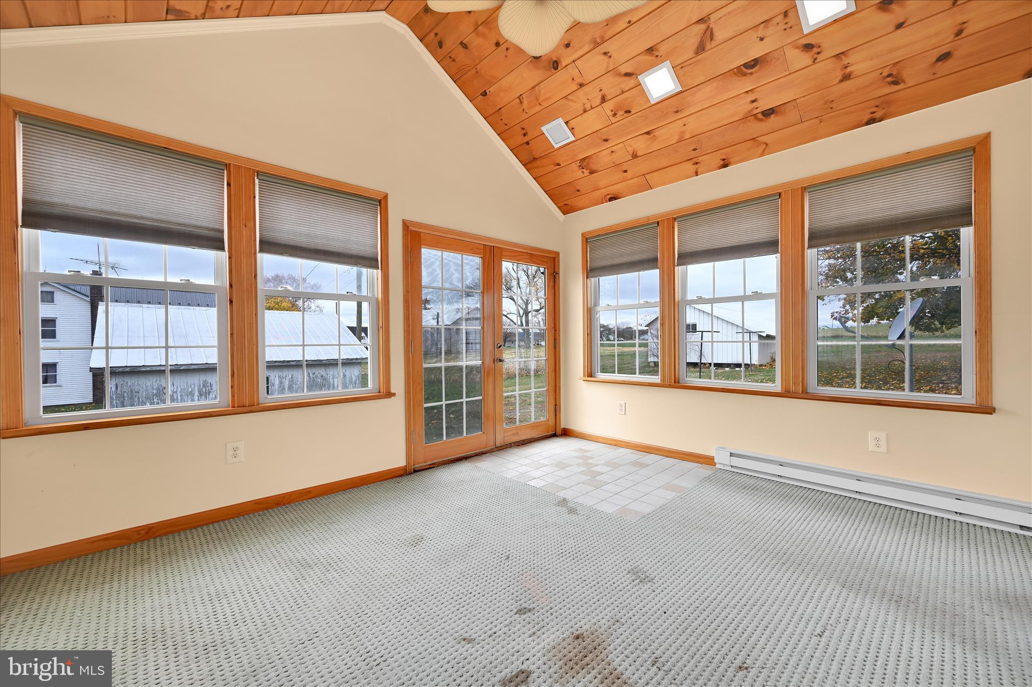 209 Ridge Road Pitman, PA 17964 - Photo 31 of 41 a view of an empty room with a window
