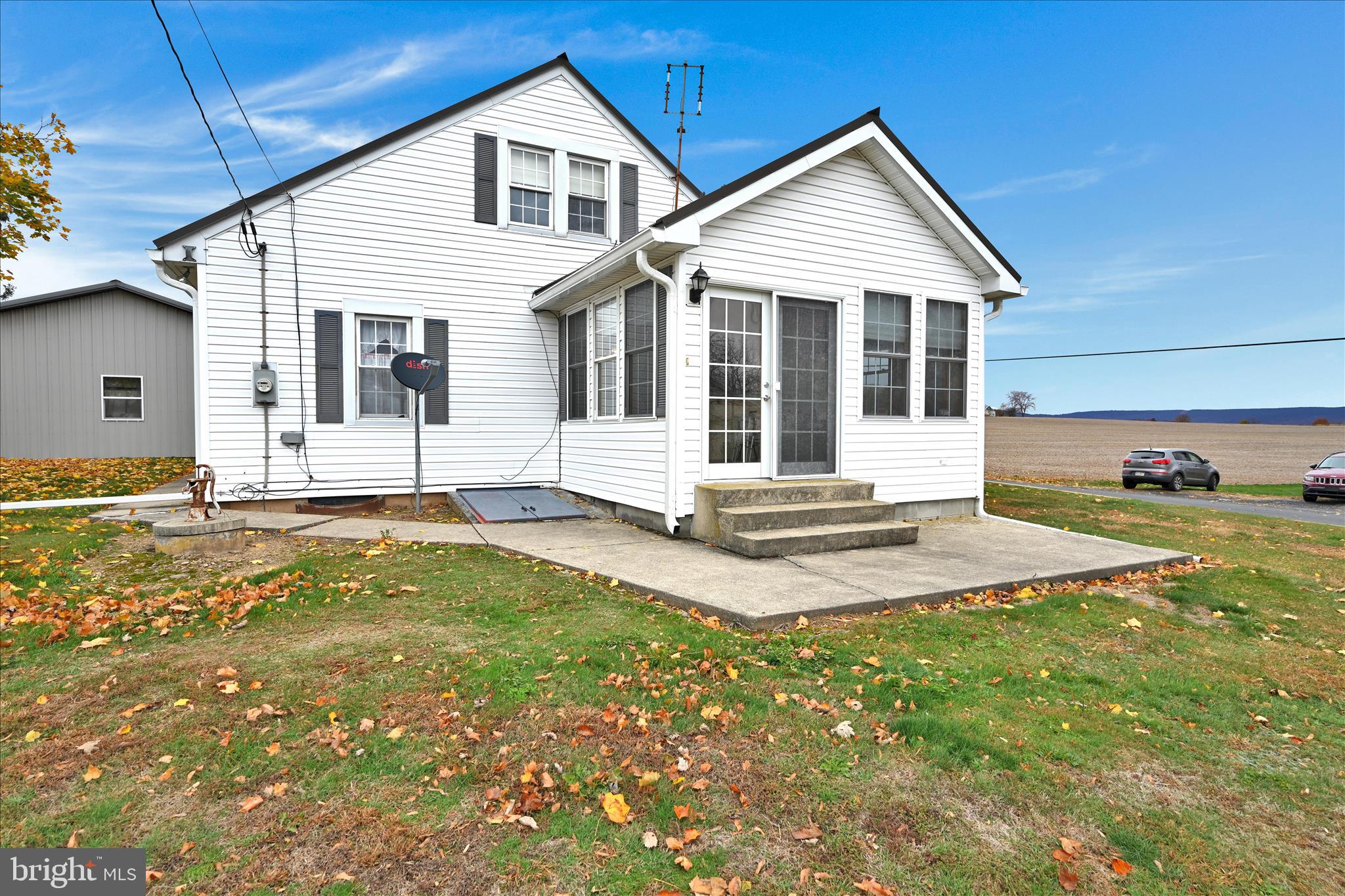 209 Ridge Road Pitman, PA 17964 - Photo 10 of 41 a front view of a house with a yard