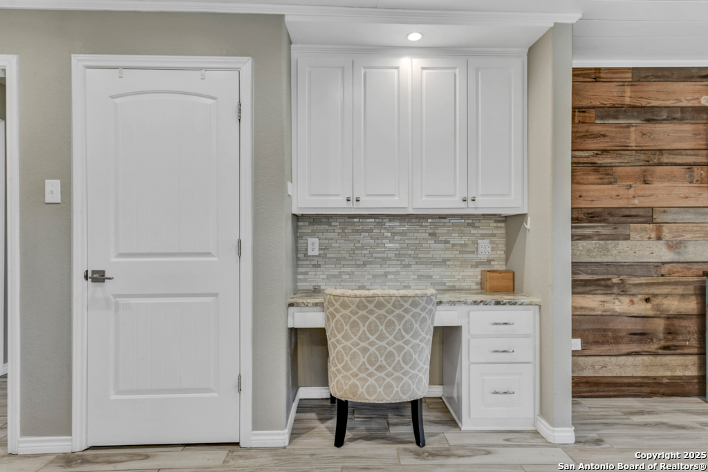 15592 Miller Road St. Hedwig, TX 78152 - Photo 14 of 47 a kitchen with a cabinets and a stove