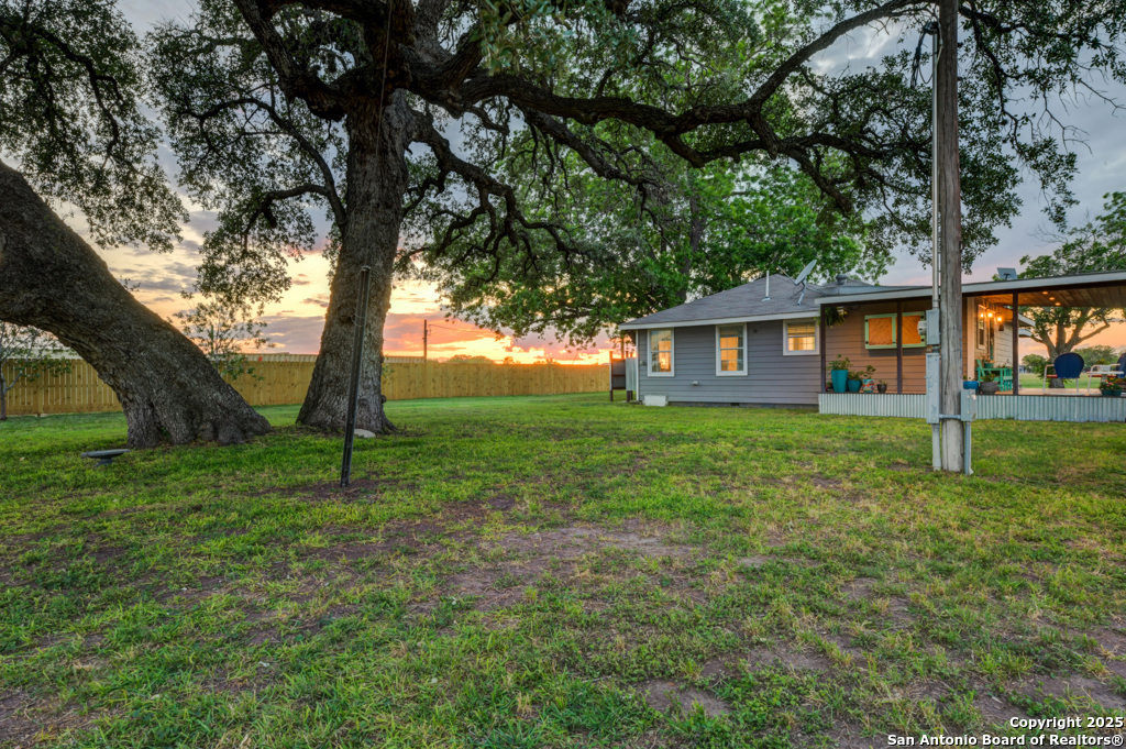 15592 Miller Road St. Hedwig, TX 78152 - Photo 24 of 47 a house view with a garden space