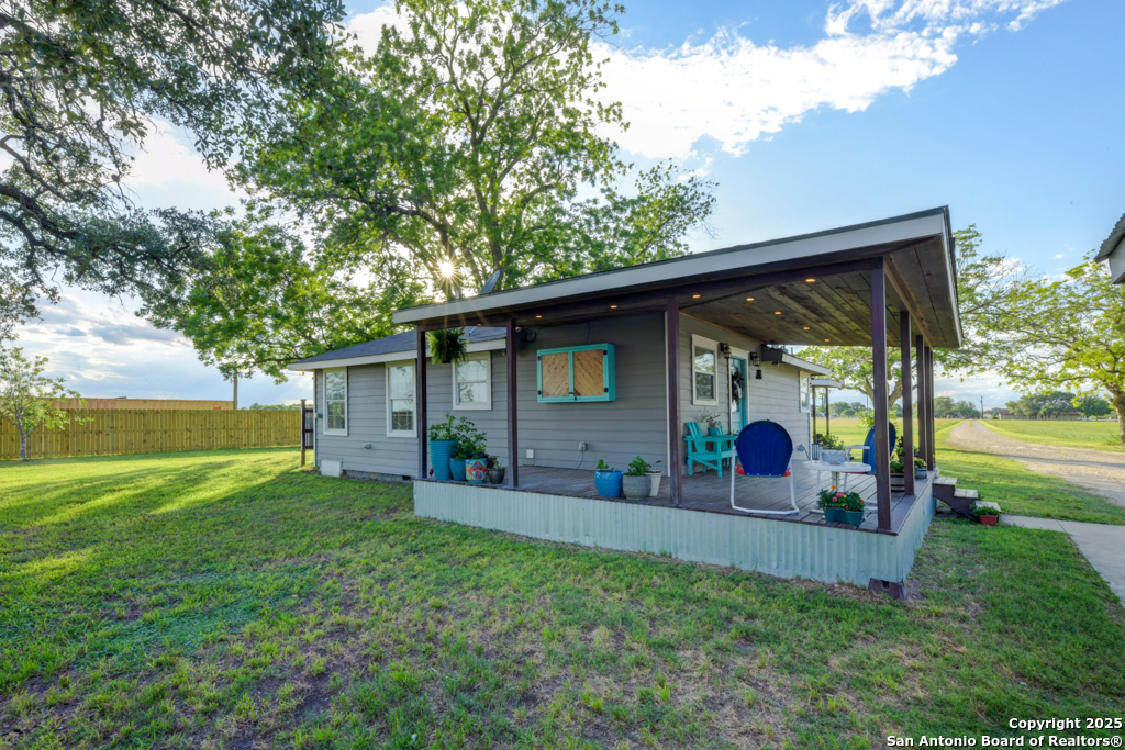 15592 Miller Road St. Hedwig, TX 78152 - Photo 31 of 47 front view of a house with a yard