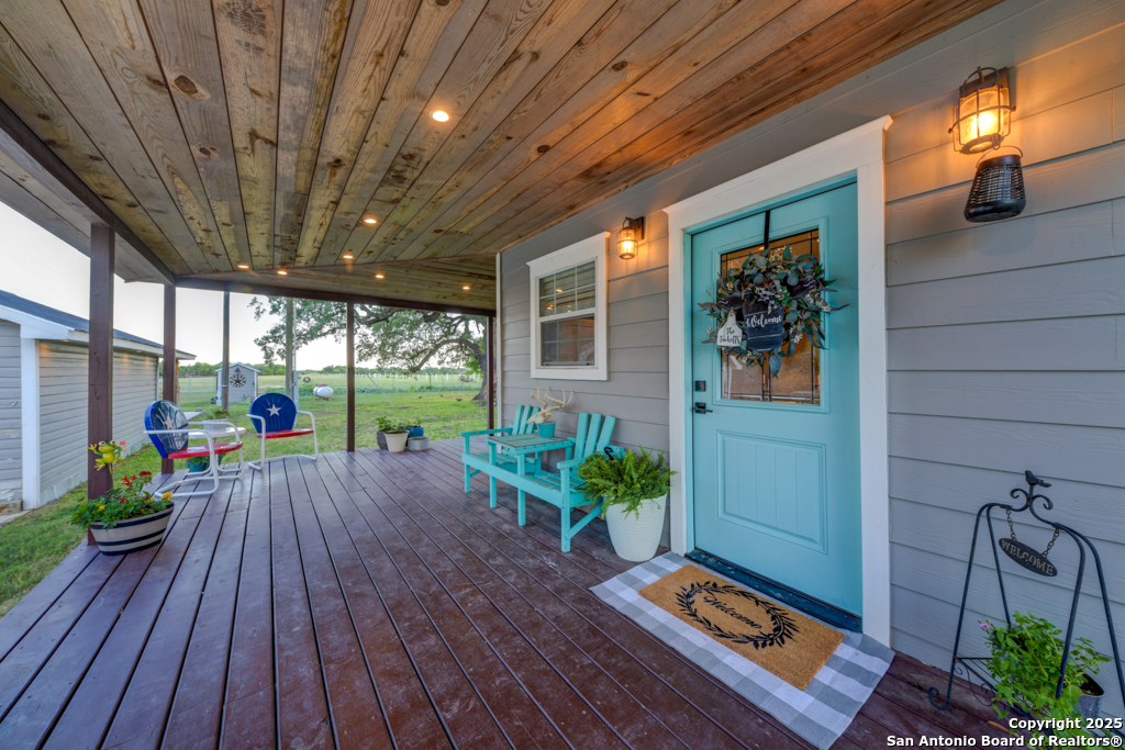 15592 Miller Road St. Hedwig, TX 78152 - Photo 34 of 47 a porch with seating space