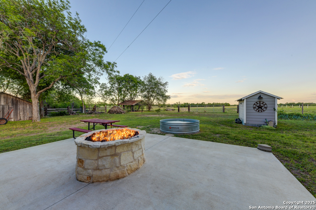 15592 Miller Road St. Hedwig, TX 78152 - Photo 36 of 47 a view of a garden with an outdoor seating
