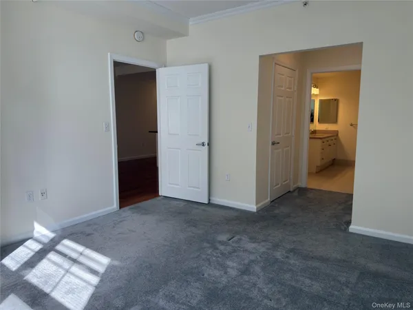 a view of a room with a wardrobe space