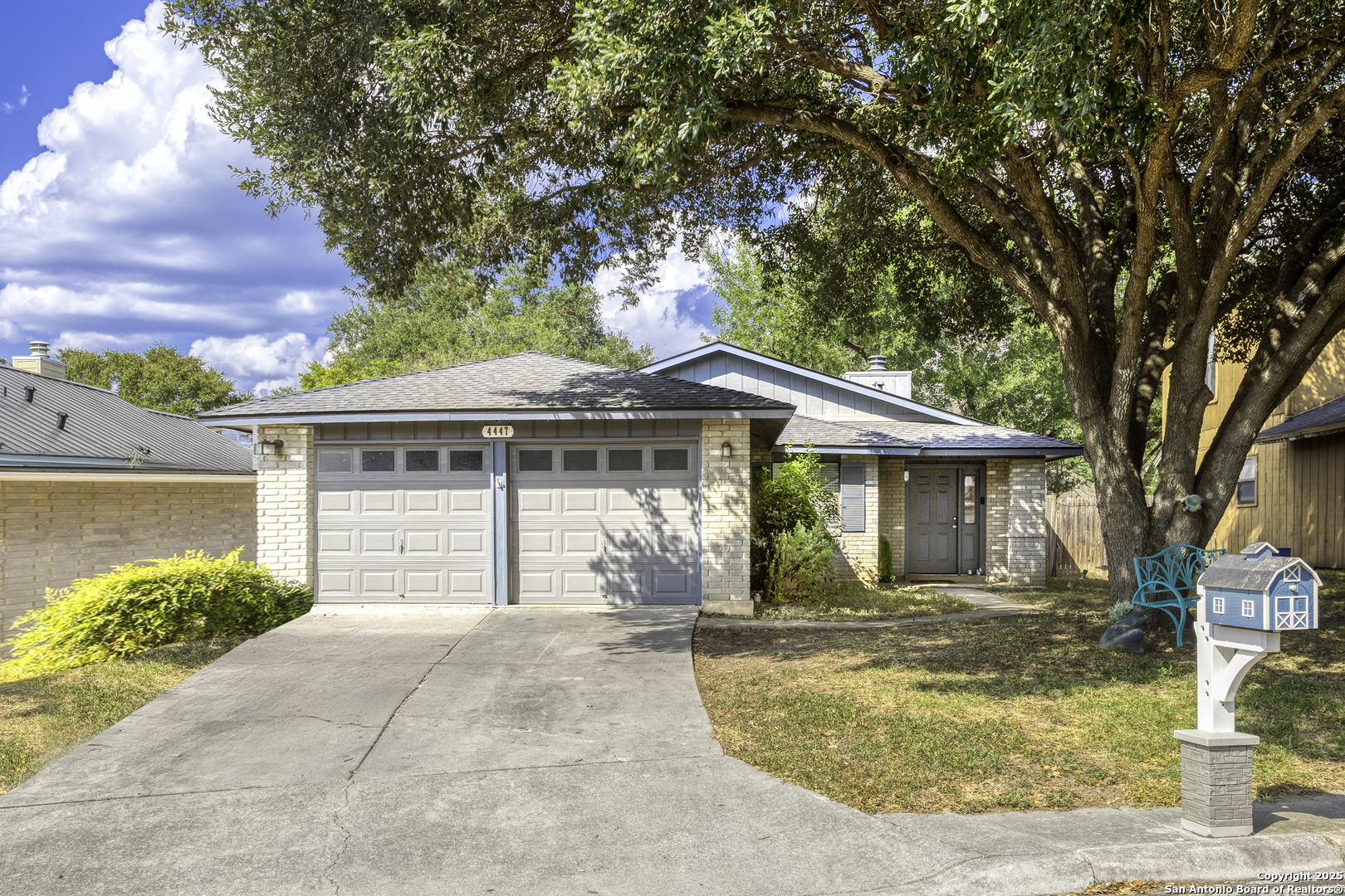 4447 Brushy Hill San Antonio, TX 78217 - Photo 1 of 13 front view of a house with a yard