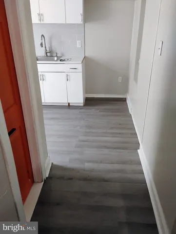 a bathroom with a toilet and a sink