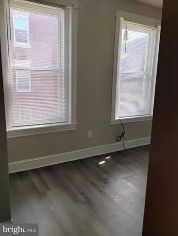 a bathroom with a shower and a toilet