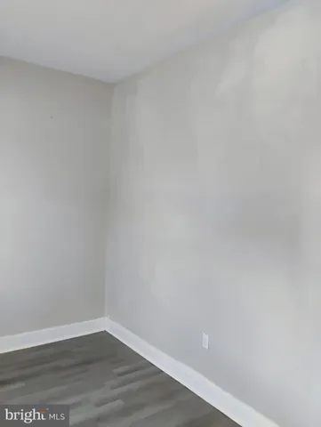 a view of a pathway along a building