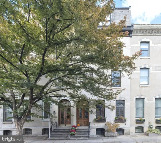 a view of a building with a street
