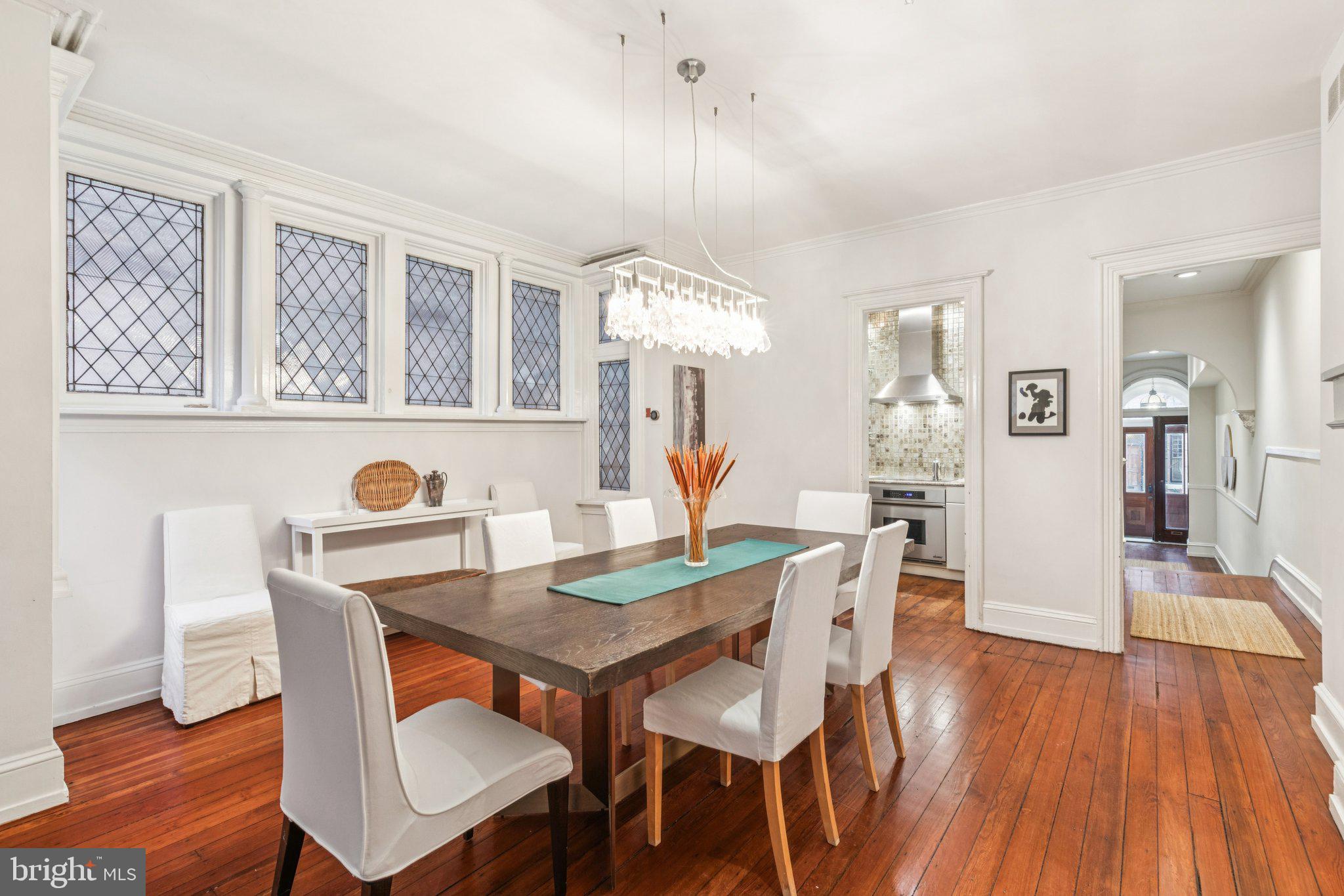 2221 Locust Street Philadelphia, PA 19103 - Photo 27 of 70 a view of a dining room with furniture window and wooden floor